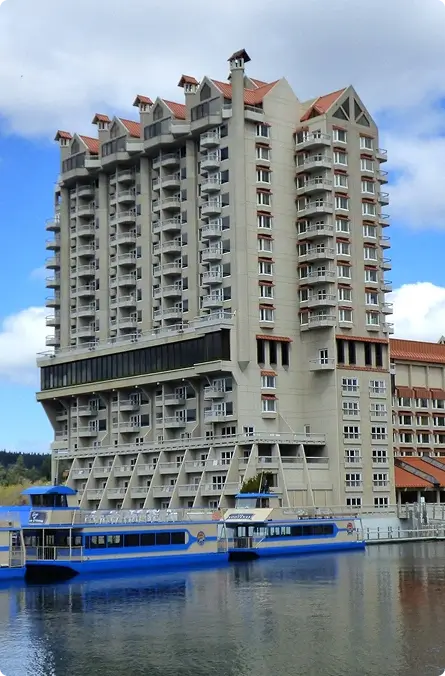 A large multi-story building with several floors visible from the front view